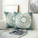 Teal & white embroidered geometric floral cushion cover living room by Decorbites