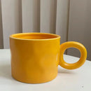 Textured blue ceramic coffee mug kitchen cup with round handle by Decorbites