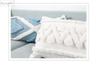 Textured blue & white geometric cushion cover with tassels living room by Decorbites