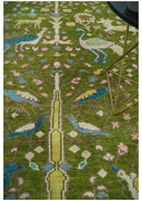 The Green Jungle Life Teal and Peach Peacock Bird Hand Knotted 8x10 Wool Area Rug by The Rug Decor