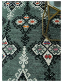 Traditional Ikat Design 5x7.6 Green, Black and Ivory Hand Knotted wool area rug