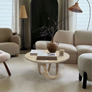 Troia Light Travertine Vein-cut Designer Round Polished Coffee Table (D)24" (H)14" living room beige couch and beige carpet