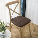 Tufted beige textured dining chair cushions for dining room by Decorbites