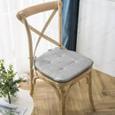 Tufted beige textured dining chair cushions for dining room by Decorbites