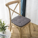 Tufted beige textured dining chair cushions for dining room by Decorbites