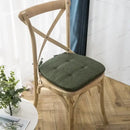 Tufted beige textured dining chair cushions for dining room by Decorbites