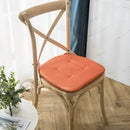 Tufted beige textured dining chair cushions for dining room by Decorbites