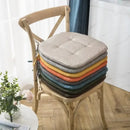 Tufted beige textured dining chair cushions for dining room by Decorbites