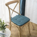 Tufted beige textured dining chair cushions for dining room by Decorbites
