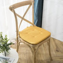 Tufted beige textured dining chair cushions for dining room by Decorbites