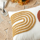 Tufted burnt orange and yellow cushion cover living room by Decorbites
