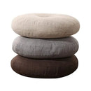 Tufted grey linen floor pillow seating cushion living room pouf by Decorbites