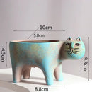 Turquoise ceramic cat succulent plant pot living room decor by Decorbites
