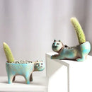 Turquoise ceramic cat succulent plant pot living room decor by Decorbites