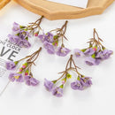 Vibrant cherry blossom artificial flowers living room floral decor by Decorbites