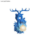 GobekUsa Loft Style Wall Mounted Sconce with Clear Crystal Shade, Blue/Gold Finish and Deer Head Accent