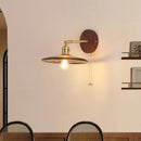Vintage brass and amber glass wall sconce stair light with pull chain by Decorbites