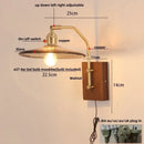 Vintage brass and amber glass wall sconce stair light with pull chain by Decorbites