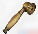Vintage brass and ceramic handheld shower head bathroom fixture by Decorbites