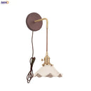 Vintage brass and scalloped glass wall sconce bedroom light by Decorbites