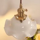 Vintage brass and scalloped glass wall sconce bedroom light by Decorbites
