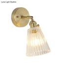 GobekUsa Postmodern Gold Wall Light with Clear Ribbed Glass - Conical Design, Rotating Feature, 1 Light Kit