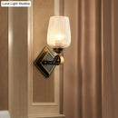 GobekUsa Contemporary Wall Mounted Light with Clear Textured Glass - Brass Finish