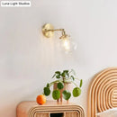 GobekUsa Champagne/Clear Prismatic Glass Single Sconce Gold Wall Light - Minimalist Globe Design