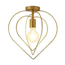 Vintage gold metal cage pendant light for restaurant and bar by Decorbites
