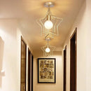Vintage gold metal cage pendant light for restaurant and bar by Decorbites
