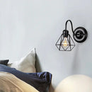 Vintage industrial cage wall lamp bedroom black metal sconce by Decorbites