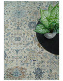 Vintage Style Ivory and Rust 8x10 Traditional Textured Low Pile Wool Rug