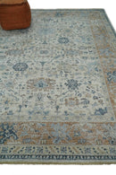 Vintage Style Ivory and Rust 8x10 Traditional Textured Low Pile Wool Rug