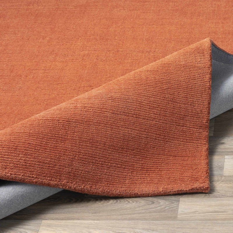 Brockton Solid Orange Wool Rug