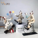 Whimsical cream circus clown joker figurine set living room decor by Decorbites