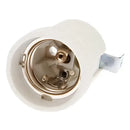 White ceramic lamp holder base with brass prongs for bedroom lighting by Decorbites