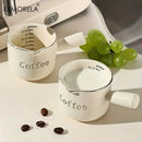 White ceramic measuring cups with silver rim – kitchen espresso tools by Decorbites