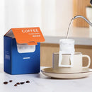 White disposable coffee filter bags kitchen pour over setup by Decorbites