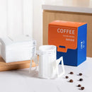White disposable coffee filter bags kitchen pour over setup by Decorbites