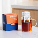 White disposable coffee filter bags kitchen pour over setup by Decorbites