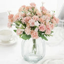 White hydrangea bouquet in ribbed glass vase for living room decor by Decorbites