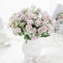 White hydrangea bouquet in ribbed glass vase for living room decor by Decorbites