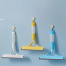 Yellow and white glass cleaning brush squeegee for bathroom tiles by Decorbites