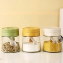 Yellow flip top glass seasoning jar with spoon kitchen spice shaker by Decorbites