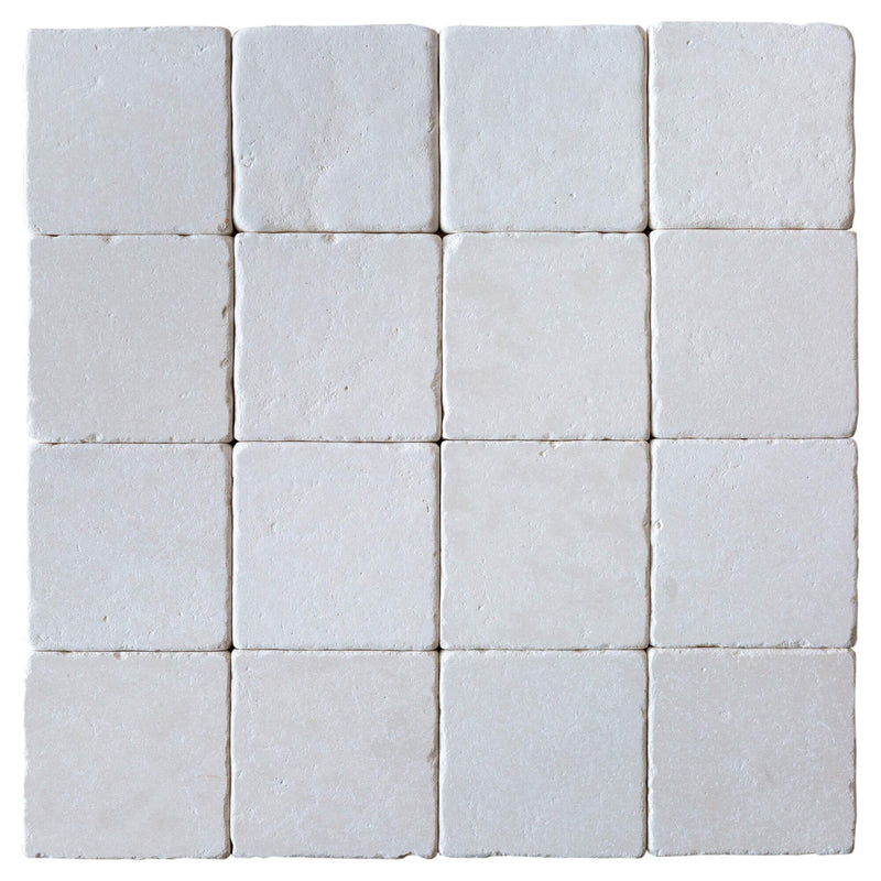 20012445 Champagne pearl tumbled limestone tiles 4x4 top view product shot