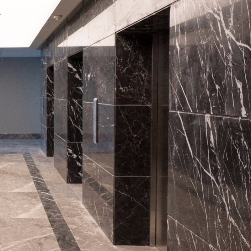 Nero Marquina Black Marble Tile Polished size 12x24 SKU-40102006 installed on building elevators wall