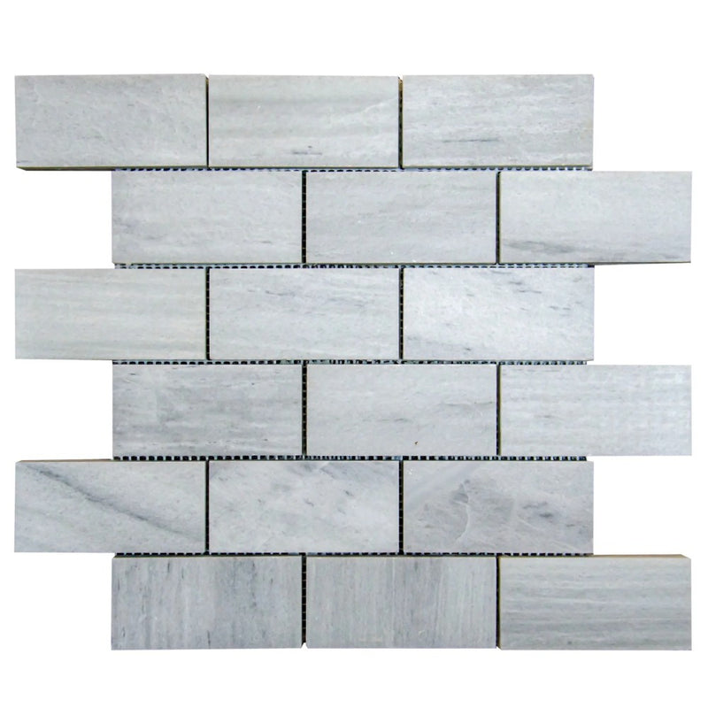 Solto White Marble 2"x4" Brick Honed on 12" x 12" Mesh Mosaic Tile SKU-HSSW2x4BMOSH on white background