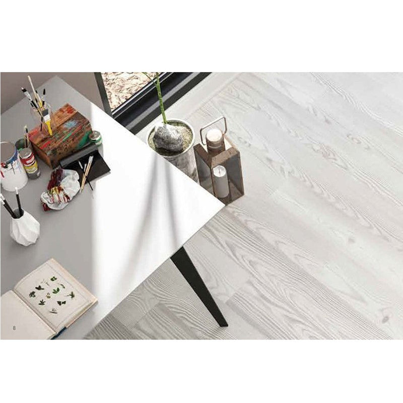 AGT Bella lilium laminate flooring wood look size 7.5"x47" thickness 8mm SKU 991982 installed on an office floor